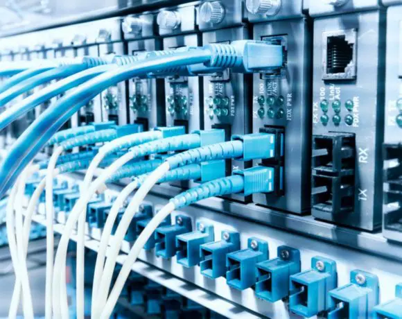 Fiber,Optic,Cables,Connected,To,Optic,Ports,And,Utp,,Network