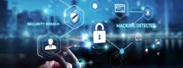 Businessman,On,Blurred,Background,Using,Antivirus,To,Block,A,Cyber