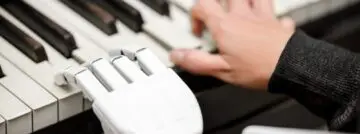 Robot,Is,Playing,A,Piano,,Closeup,Shot,From,A,Robotic